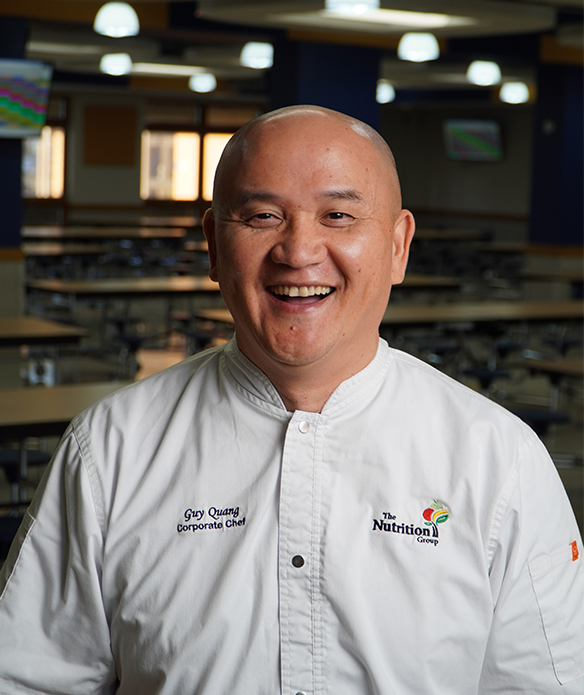 Smiling headshot of Chef Guy.
