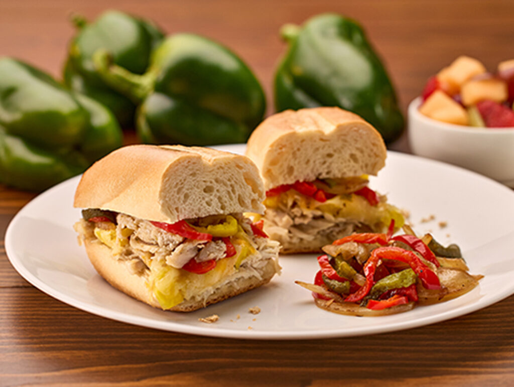 A plated sandwich that is cut in half.